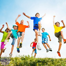 Multiple kids jumping in the air