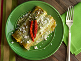 Green Chile enchilada on plate 